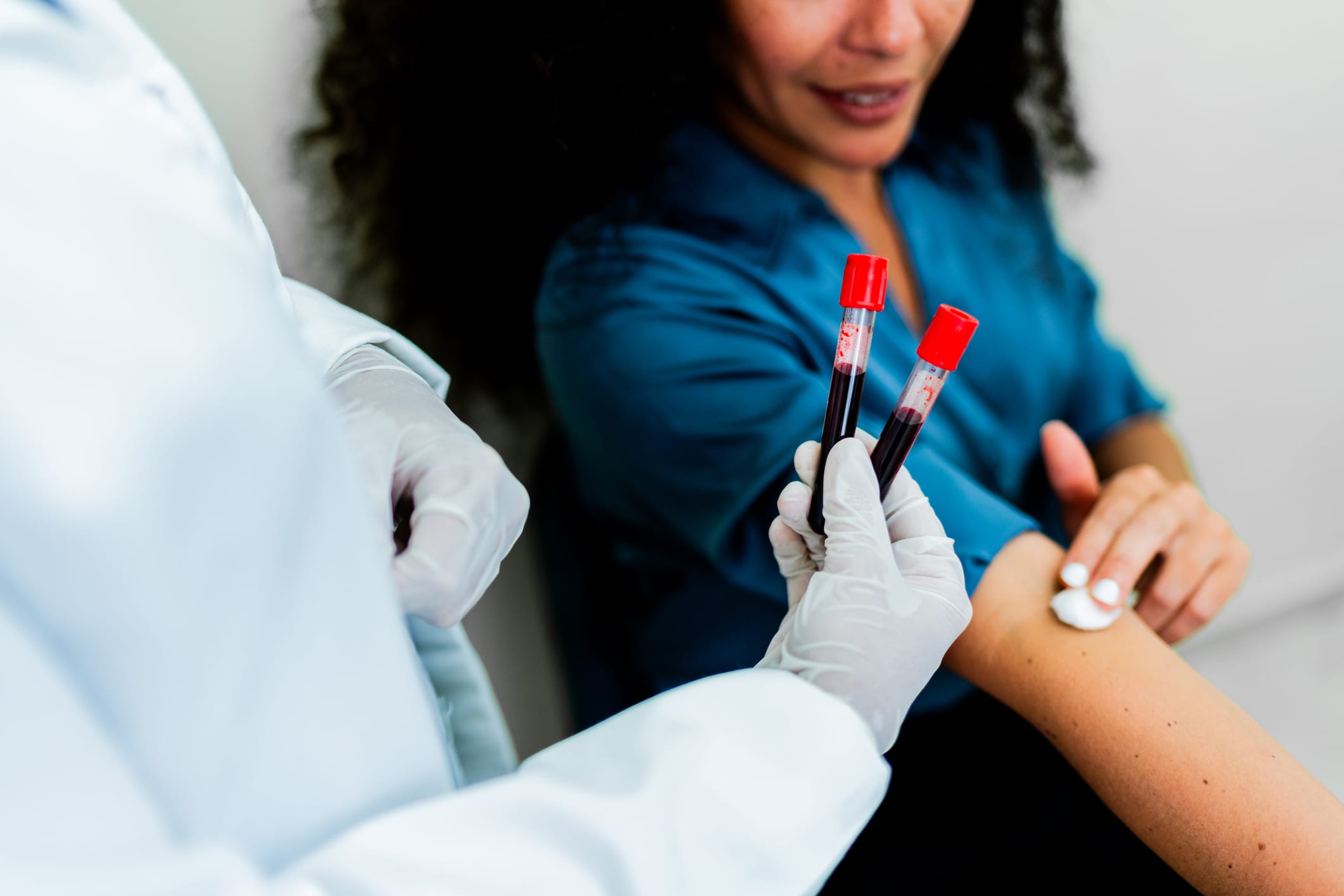 Close-up of doctor holding a blood collection tube at hospital